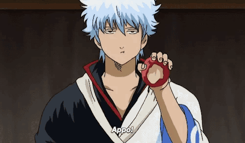 a cartoon character is holding a red object in his hand and says appo !