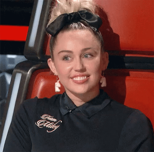 Winky GIF - Miley Cyrus Wink Cute GIFs