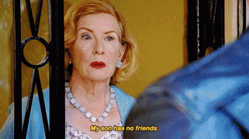 an older woman is talking to a man and says my son has no friends .