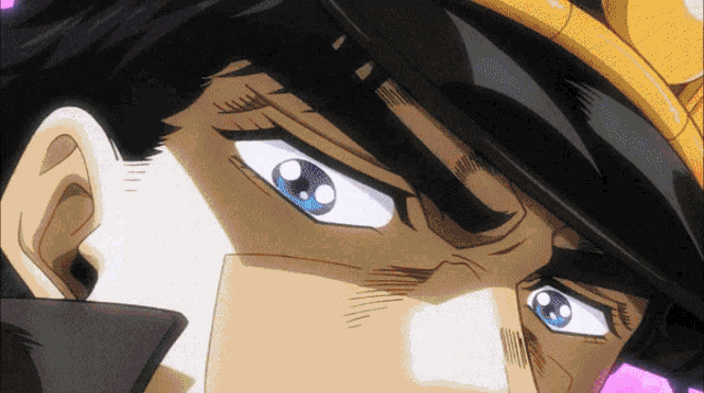 a close up of a person 's face with a hat on