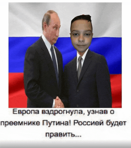 a man in a suit and tie shakes hands with another man