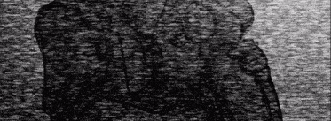 a black and white photo of a person standing in front of a wall .