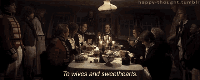 a group of people sitting around a table with the words to wives and sweethearts written below them