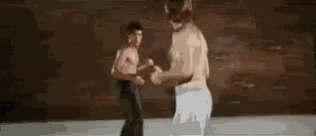 Bruce Lee Fight GIF - Bruce Lee Fight Punch GIFs