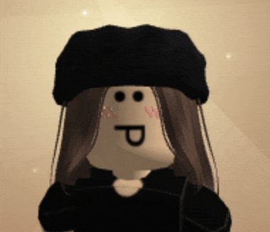 a girl wearing a black hat and a black shirt has a smiley face on her face
