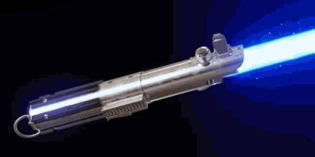 a close up of a light saber with a blue light coming out of the end