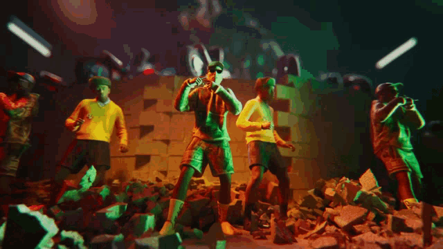 a group of men are breaking a brick wall