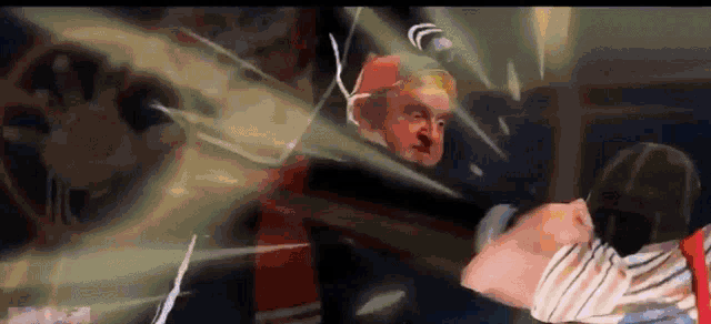 donald trump is being punched in the face by a person