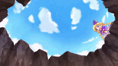 a girl with a crown on her head is flying through the air