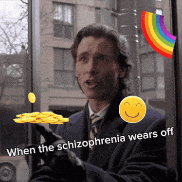 a man in a suit and tie says when the schizophrenia wears off in front of a window