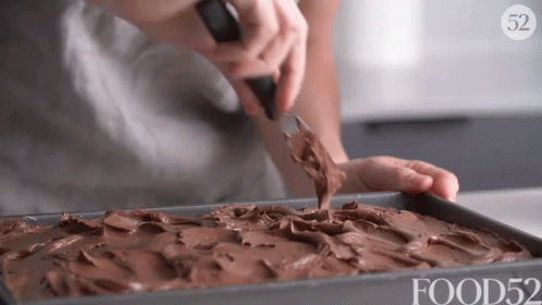 Spreading Choclate Icing GIF - Spreading Choclate Icing Dessert GIFs
