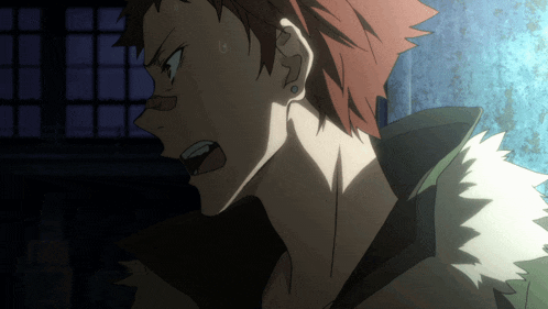 a close up of a person 's face with a shocked look on their face