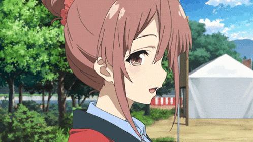 a close up of a girl 's face in front of a white tent