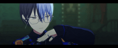 a man with glasses and a ring on his finger