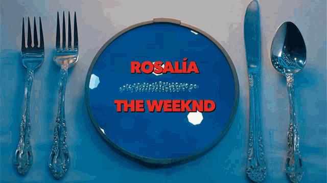 a plate with silverware on it and the words rosalia the weeknd