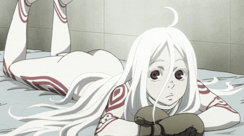 a girl with long white hair is laying on her stomach