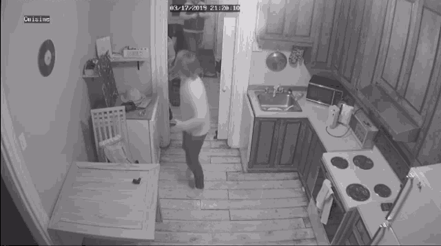a black and white photo of a kitchen with the date 03-17-2015 at the top