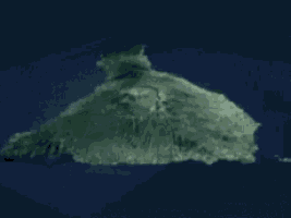 an aerial view of a large island in the middle of the ocean .