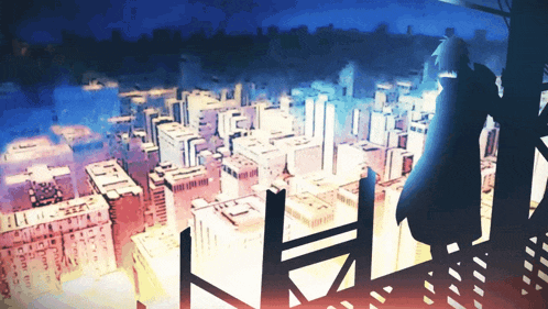 a person standing on a balcony looking out over a city