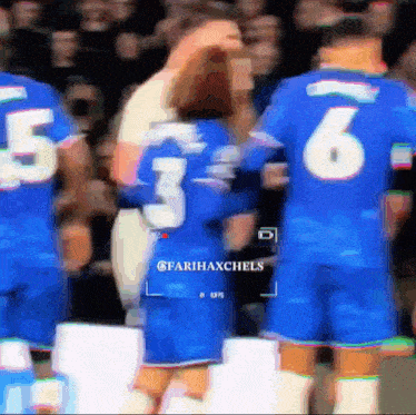 a blurry photo of soccer players with the number 6 on the back