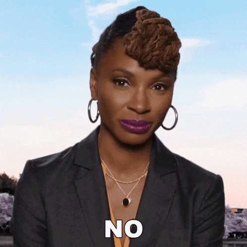 a woman wearing a black jacket and purple lipstick says no