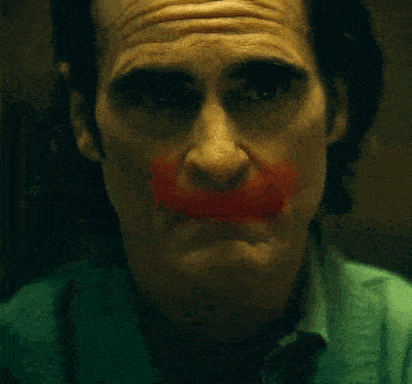 The Joker Lipstick GIF - The Joker Joker Lipstick GIFs