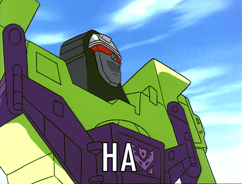 a green and purple robot with the word " ha " on its chest