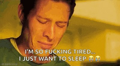 a man is crying with the words `` i 'm so fucking tired ... i just want to sleep '' .