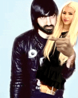 a man with a beard and a woman with blonde hair are posing for a photo