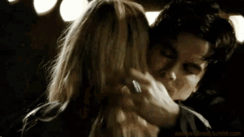 a close up of a man and a woman kissing with a tumblr.com logo in the corner