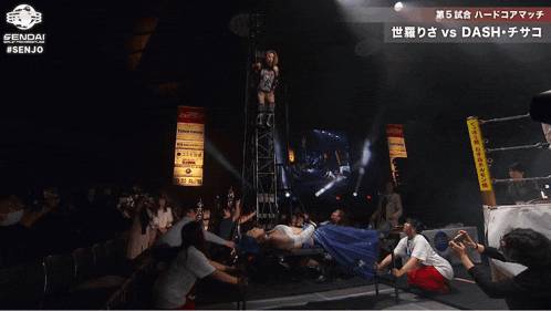 a wrestling match between dash and senjo is being shown on a television screen