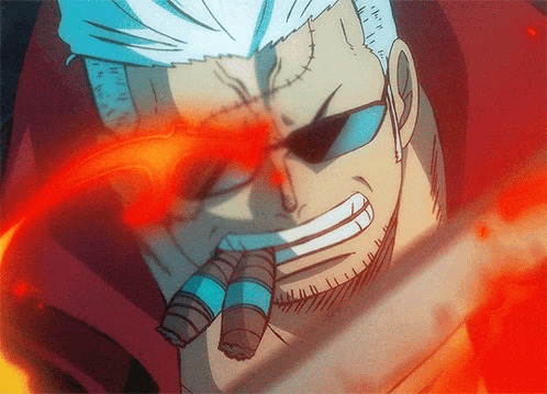 a close up of a man 's face with a fire coming out of his mouth