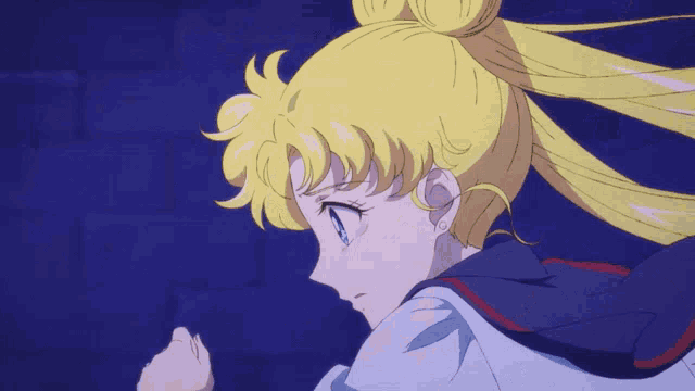a close up of a girl with blonde hair
