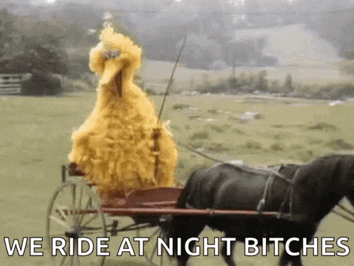 big bird is pulling a horse drawn carriage in a field