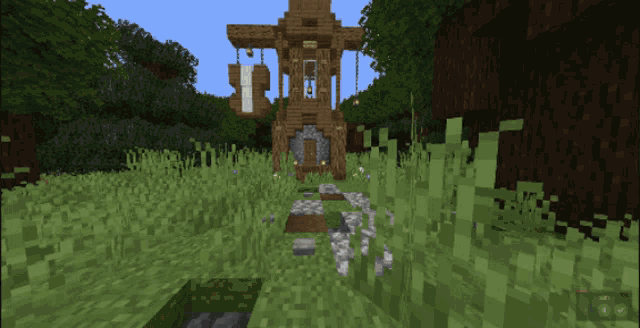 a screenshot of a minecraft game shows a tower in the middle of a grassy field