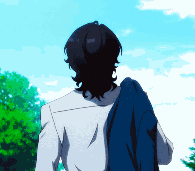 a man in a white shirt is carrying a blue jacket on his shoulder