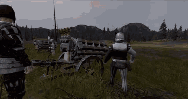 a man in armor is standing in front of a cannon in a video game .