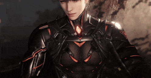 a close up of a man in a futuristic suit with a triangle on his chest