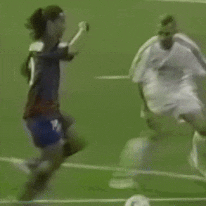 a soccer player with the number 10 on his back is kicking a ball