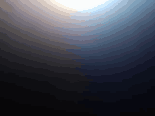 a dark background with a light shining through the middle