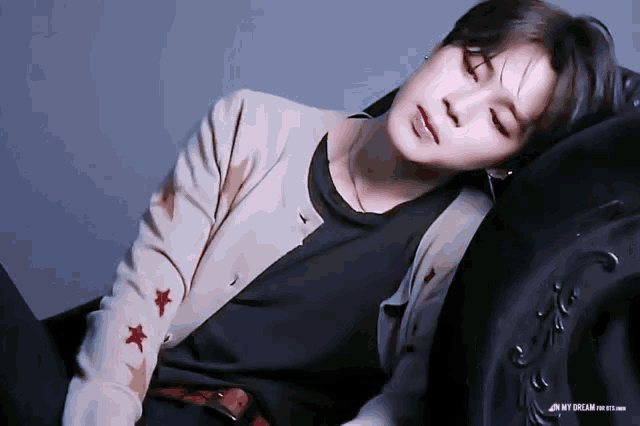 a person laying on a couch with the words my dream on the bottom right