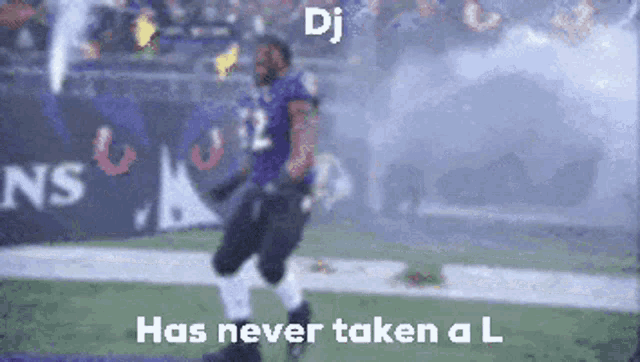 a blurred image of a football player with the words " dj has never taken a l "
