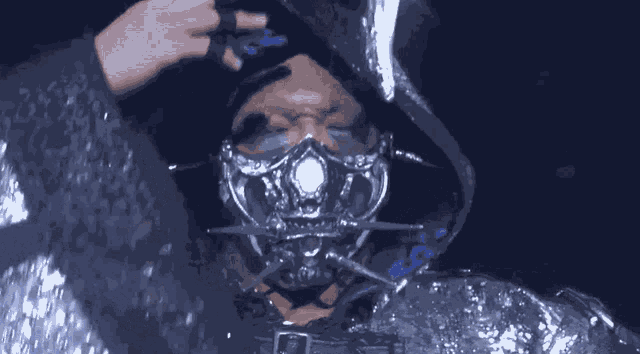 a person wearing a mask with a light on the front