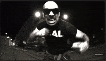 a black and white photo of a man with a full screen watermark