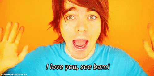 a young man in a blue shirt is making a funny face and saying `` i love you , see bam ! ''