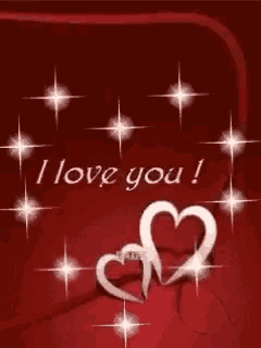 a red background with two hearts and the words `` i love you '' written on it .