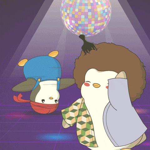 a couple of penguins are dancing in front of a disco ball