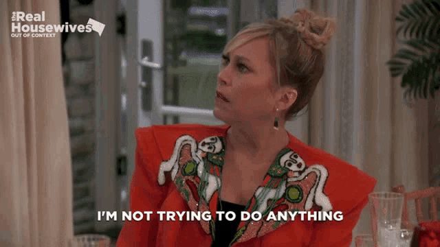 a woman says " i 'm not trying to do anything "
