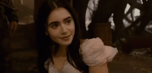 Lily Collins Smiling GIF - Lily Collins Smiling Mirror Mirror GIFs