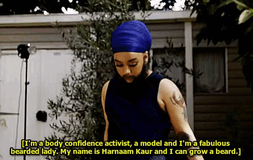 a woman with a beard and a blue turban is talking about herself